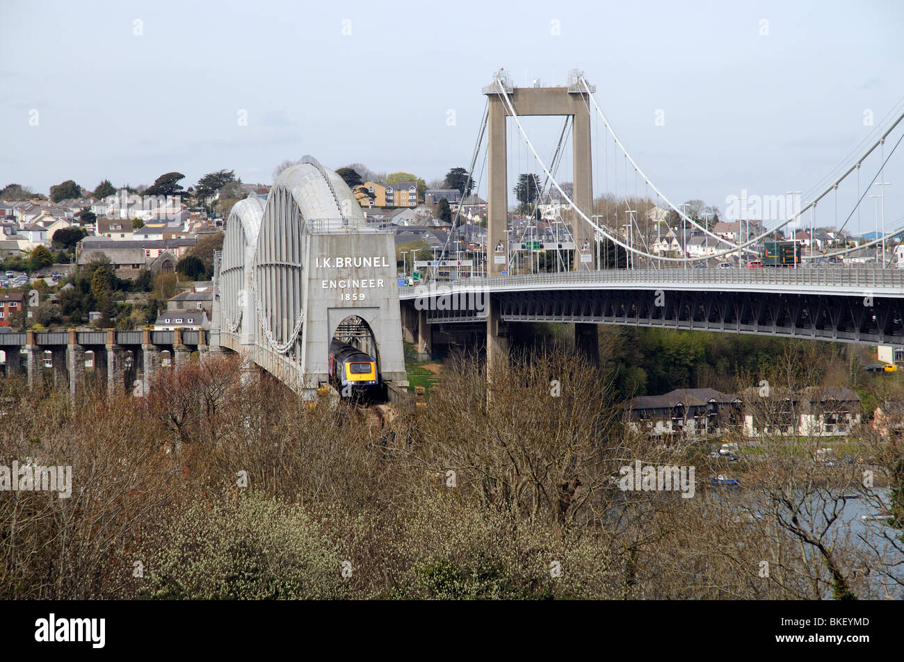 A First Great Western train crossing the Brunel Bridge which runs parallel with the Tamar toll Bridge Stock Photo