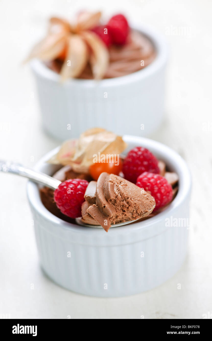 Two chocolate mousse desserts with a spoon Stock Photo
