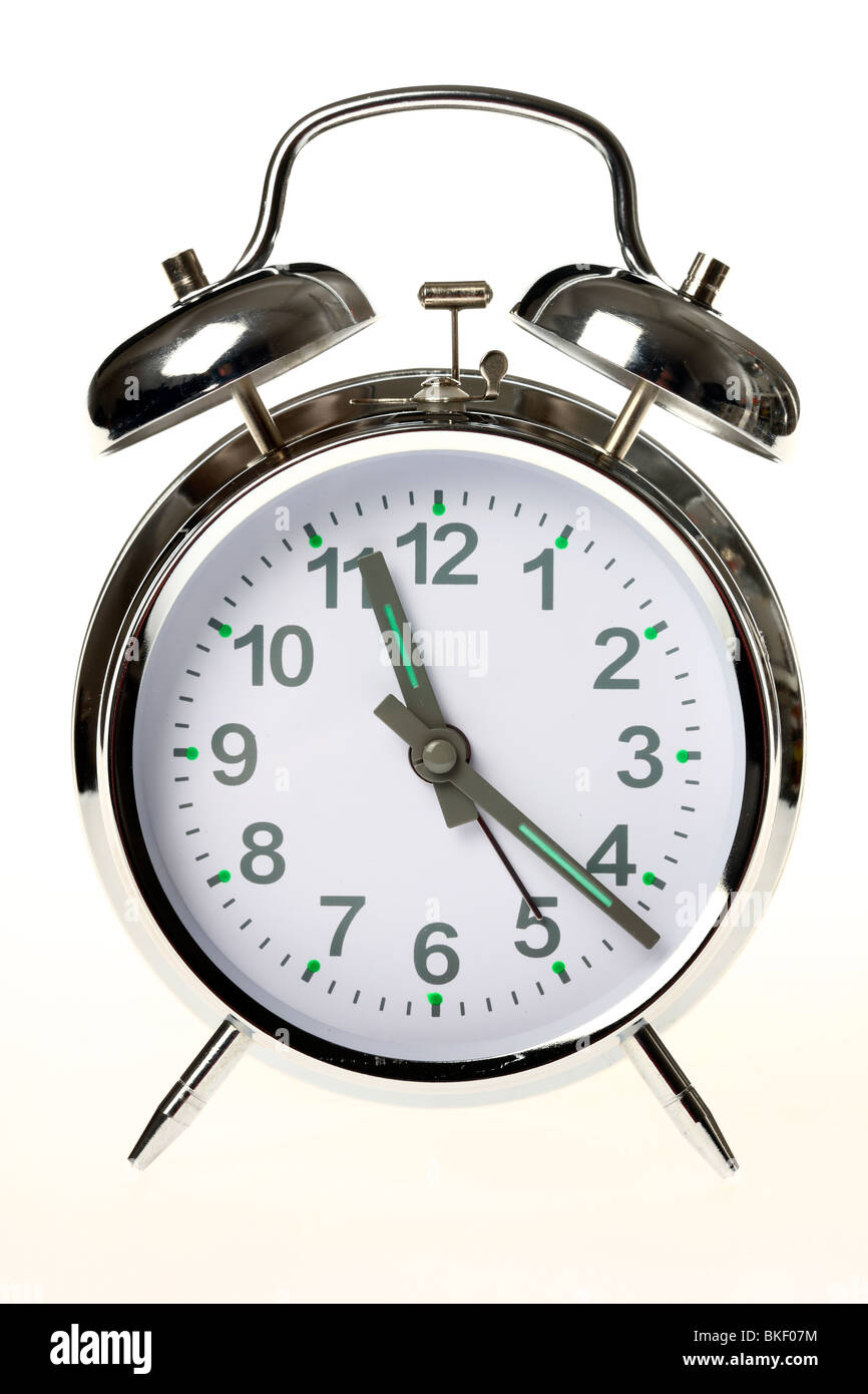 alarm clock consists of metal, mechanical clockwork and bellwork Stock Photo
