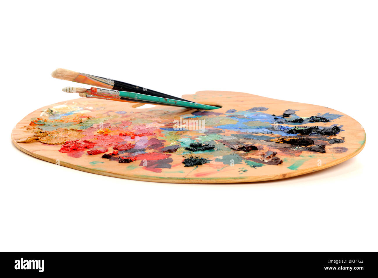 Artist palette with brushes - Selective focus Stock Photo