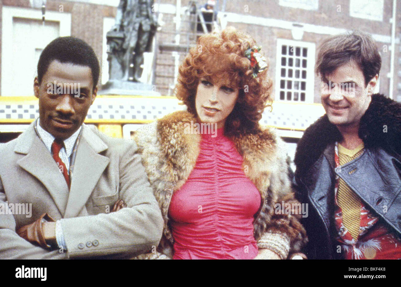 TRADING PLACES (1983) EDDIE MURPHY, JAMIE LEE CURTIS, DAN AYKROYD TRP 033 Stock Photo