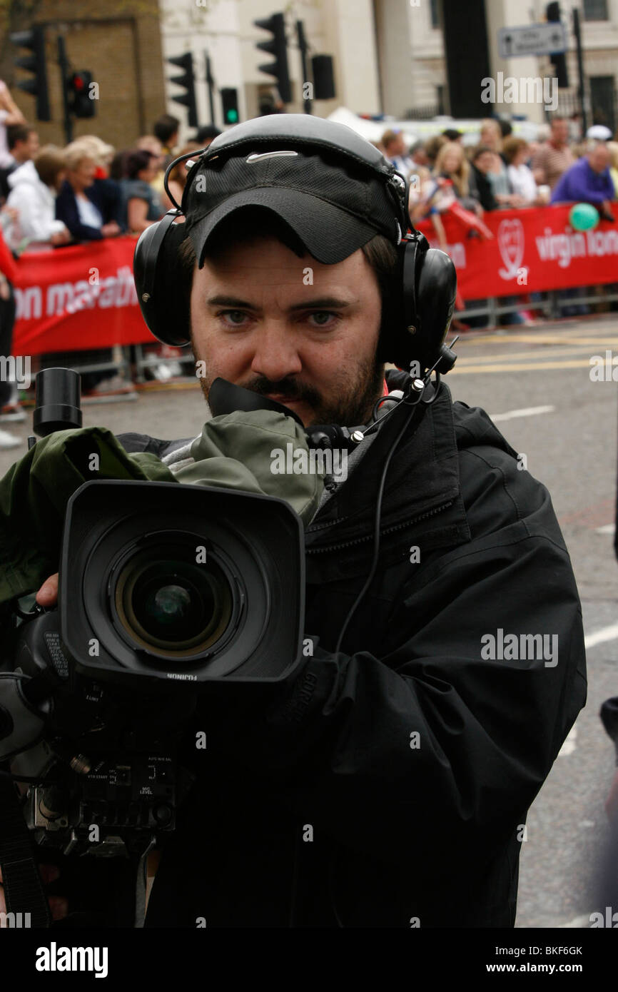 BBC cameraman filming crowd in London Stock Photo Alamy
