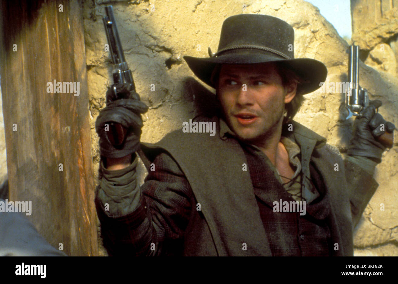 YOUNG GUNS II: BLAZE OF GLORY (1990) YOUNG GUNS 2 (ALT) CHRISTIAN SLATER YN2 005 Stock Photo