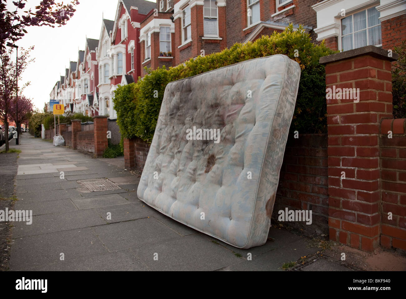 Dirty mattress left in a North London Street Stock Photo Alamy