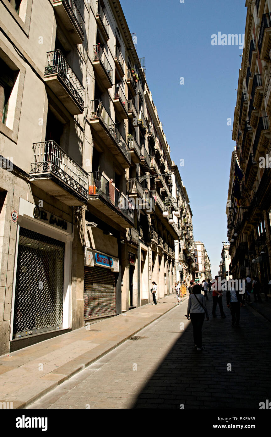 balconies of flats in Barcelona spain above shops Stock Photo