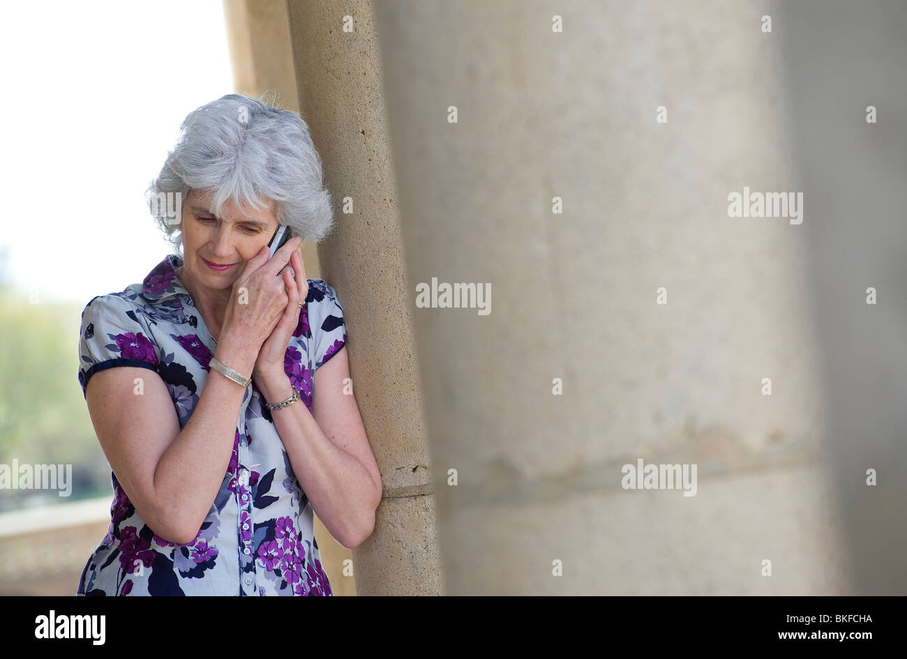Phone call mature woman hi-res stock photography and images - Alamy