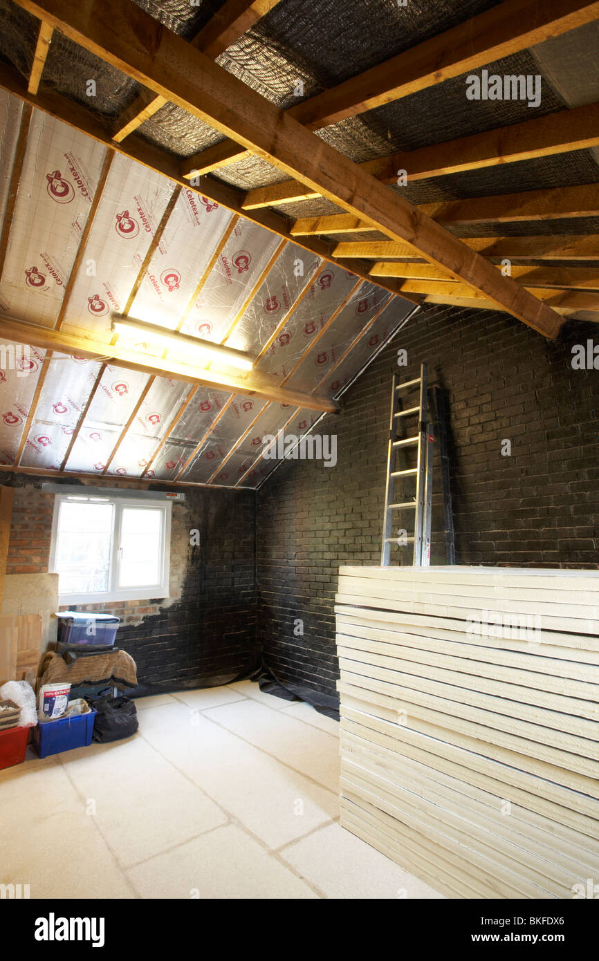 Garage conversion into habitable room for residential house, UK Stock Photo