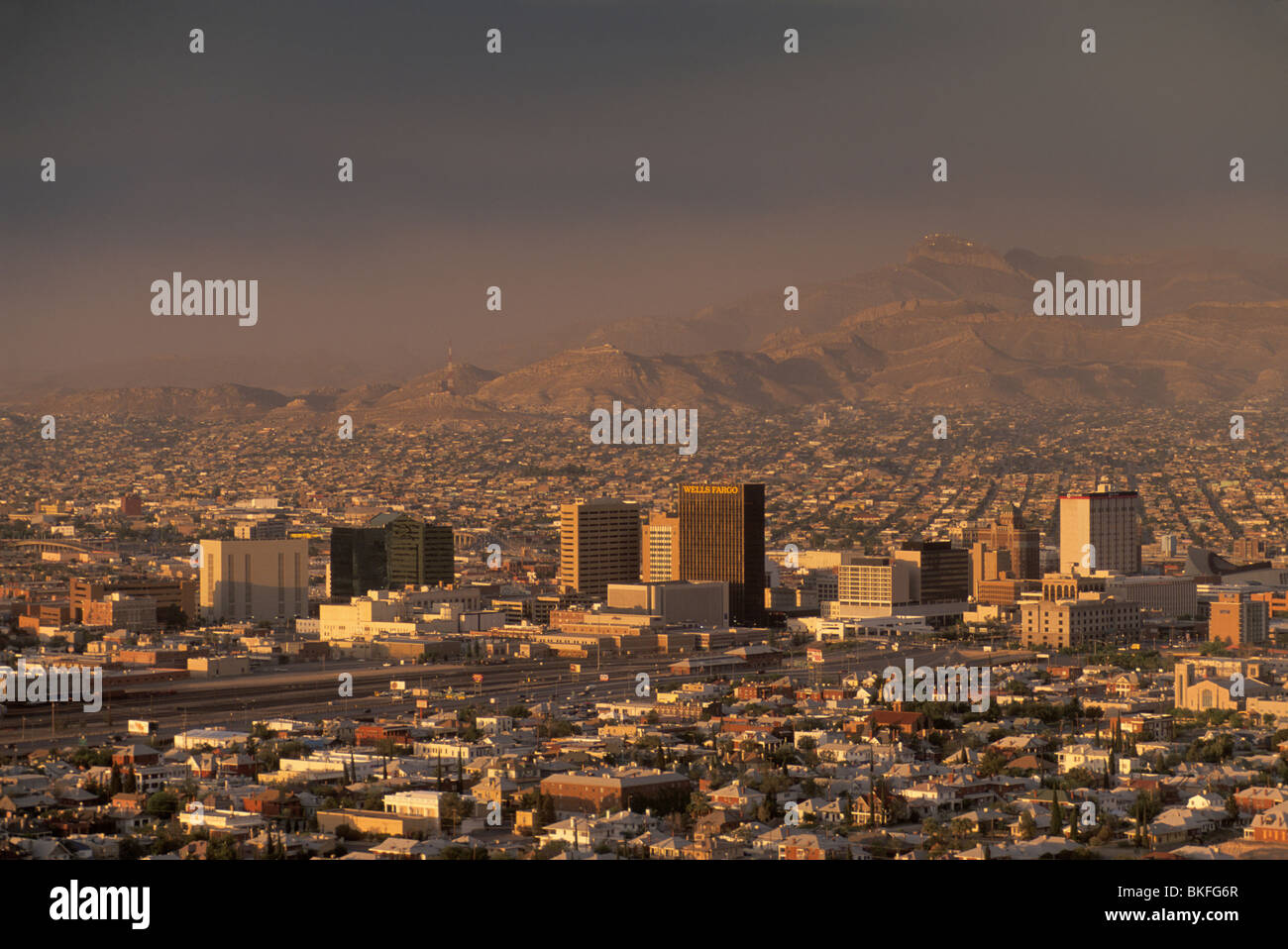 Downtown of El Paso, Texas, seen at sunrise from Murchison Park, with Ciudad Juarez, Mexico, shrouded in morning fog in distance Stock Photo