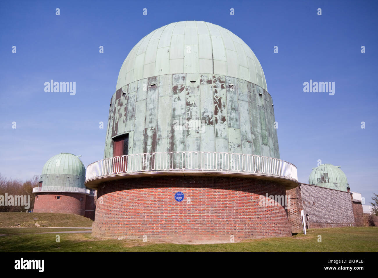 Domes at Herstmonceux Observatory, formerly part of the Royal Greenwich Observatory Stock Photo