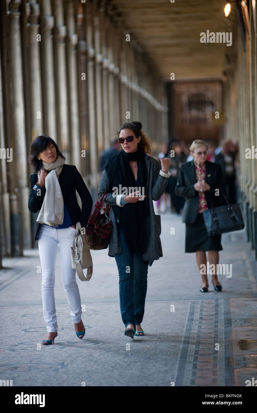 French Women Walking, in Colonnade, Enjoying Urban Park, "Jardin du