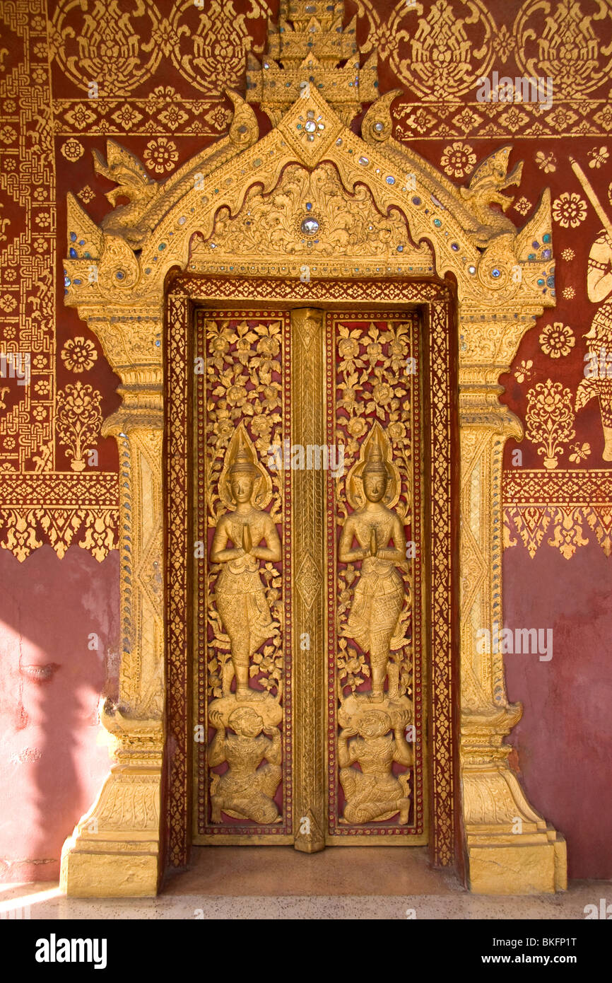 Wat Saen's decorated entrance door in Luang Prabang, Laos Stock Photo
