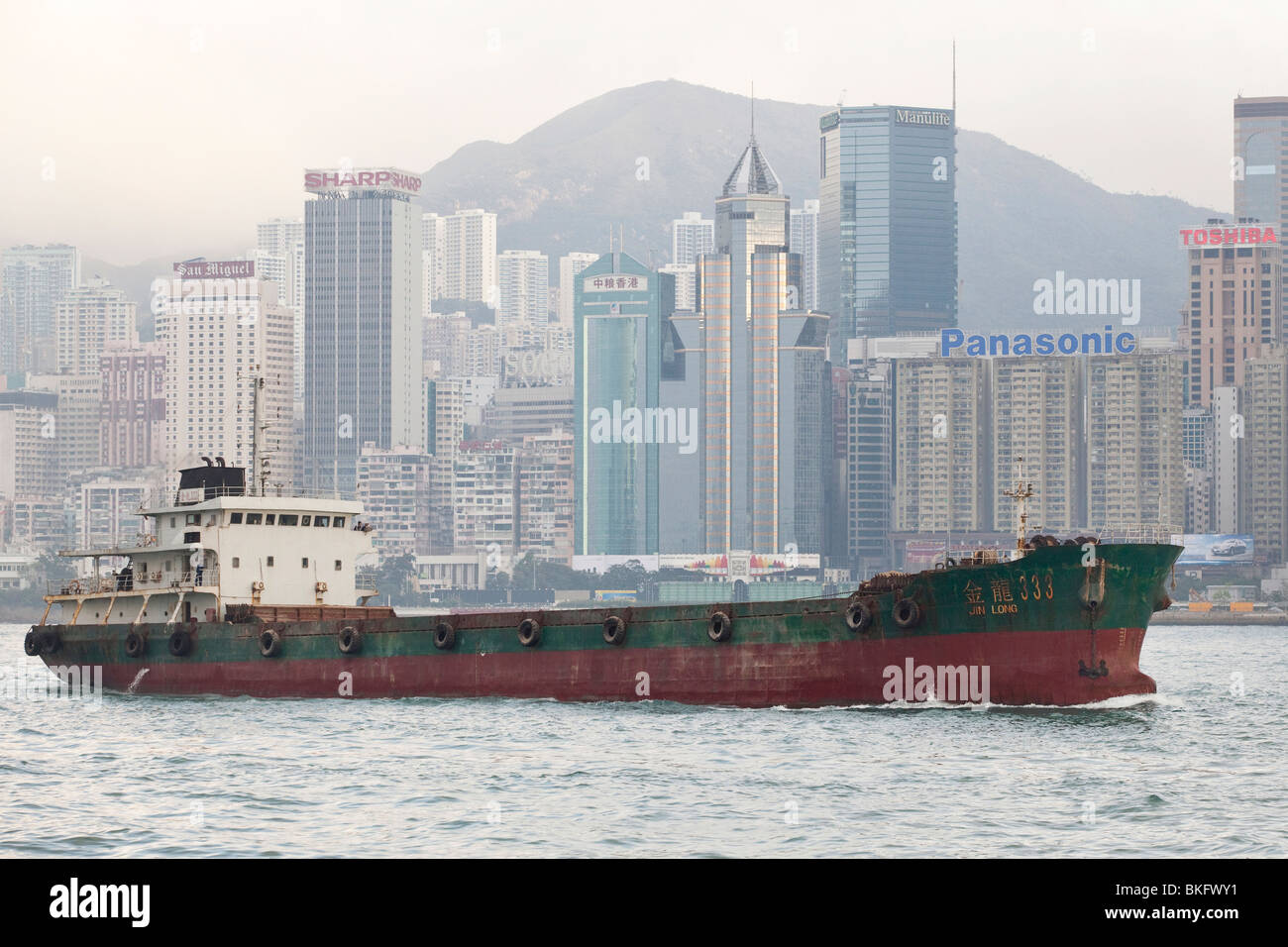 Ship sailing through Hong Kong Harbour Stock Photo Alamy