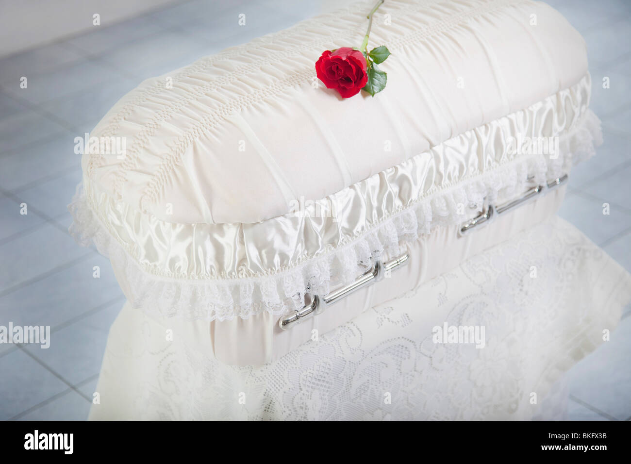 A Rose Placed On An Infant's Coffin Stock Photo Alamy