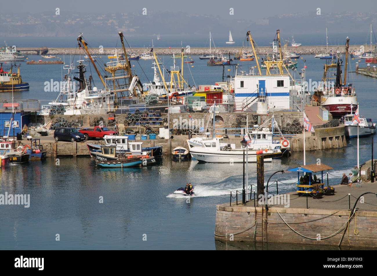 Commercial fishing boats in Brixham harbour south Devon England UK Stock Photo