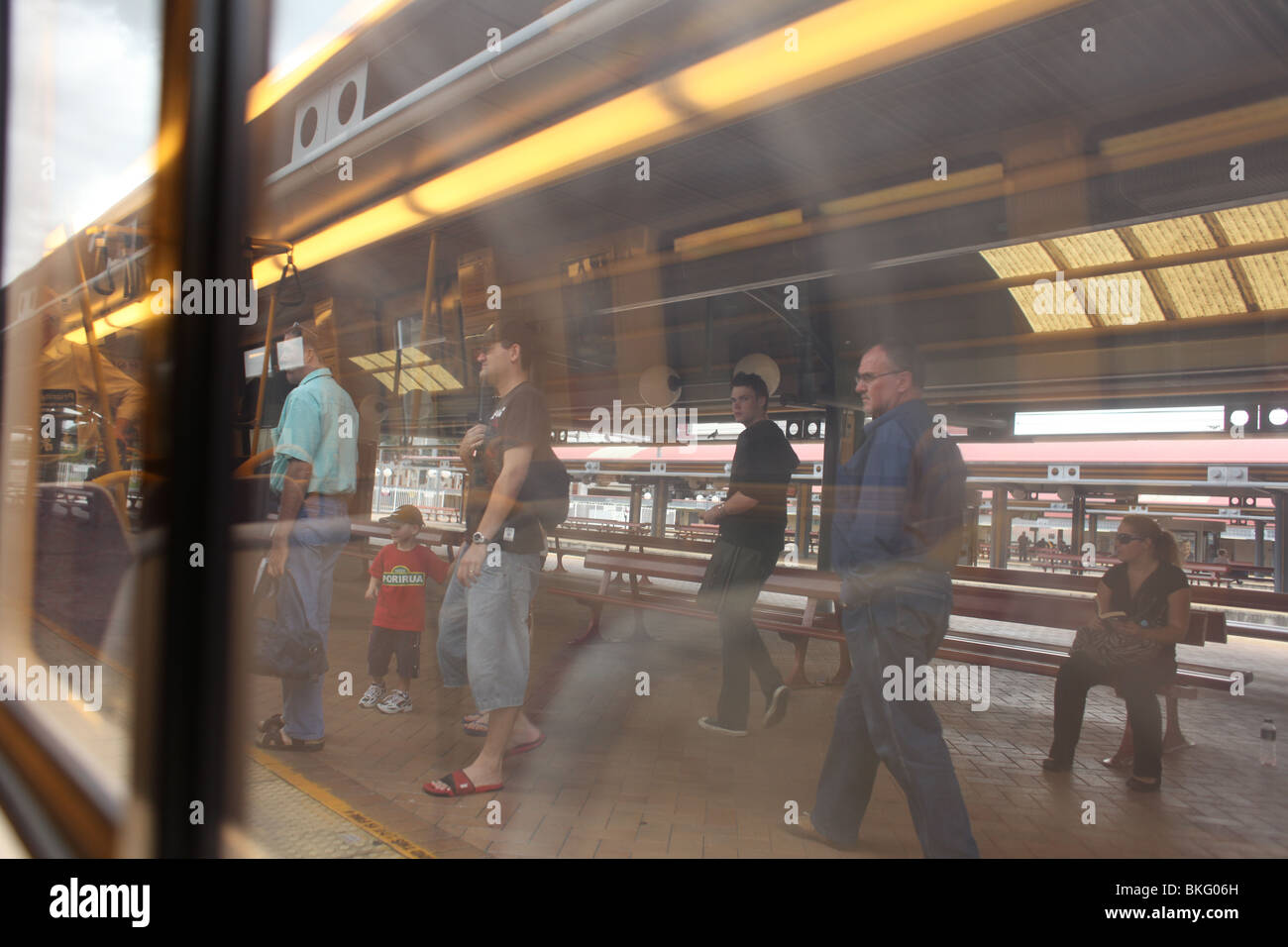 People boarding the train from Brisbane to Gold Coast, Australia Stock