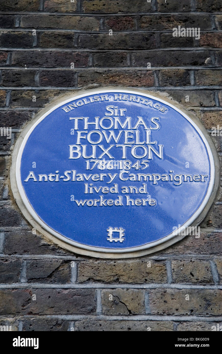 Sir Thomas Fowell Buxton 1786-1845 English Heritage blue plaque. Anti- Slavery campaigner lived here. Brick Lane London E1 UK Stock Photo
