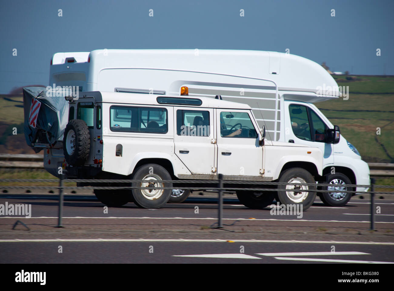 Motor home & Land Rover on the M62. Stock Photo