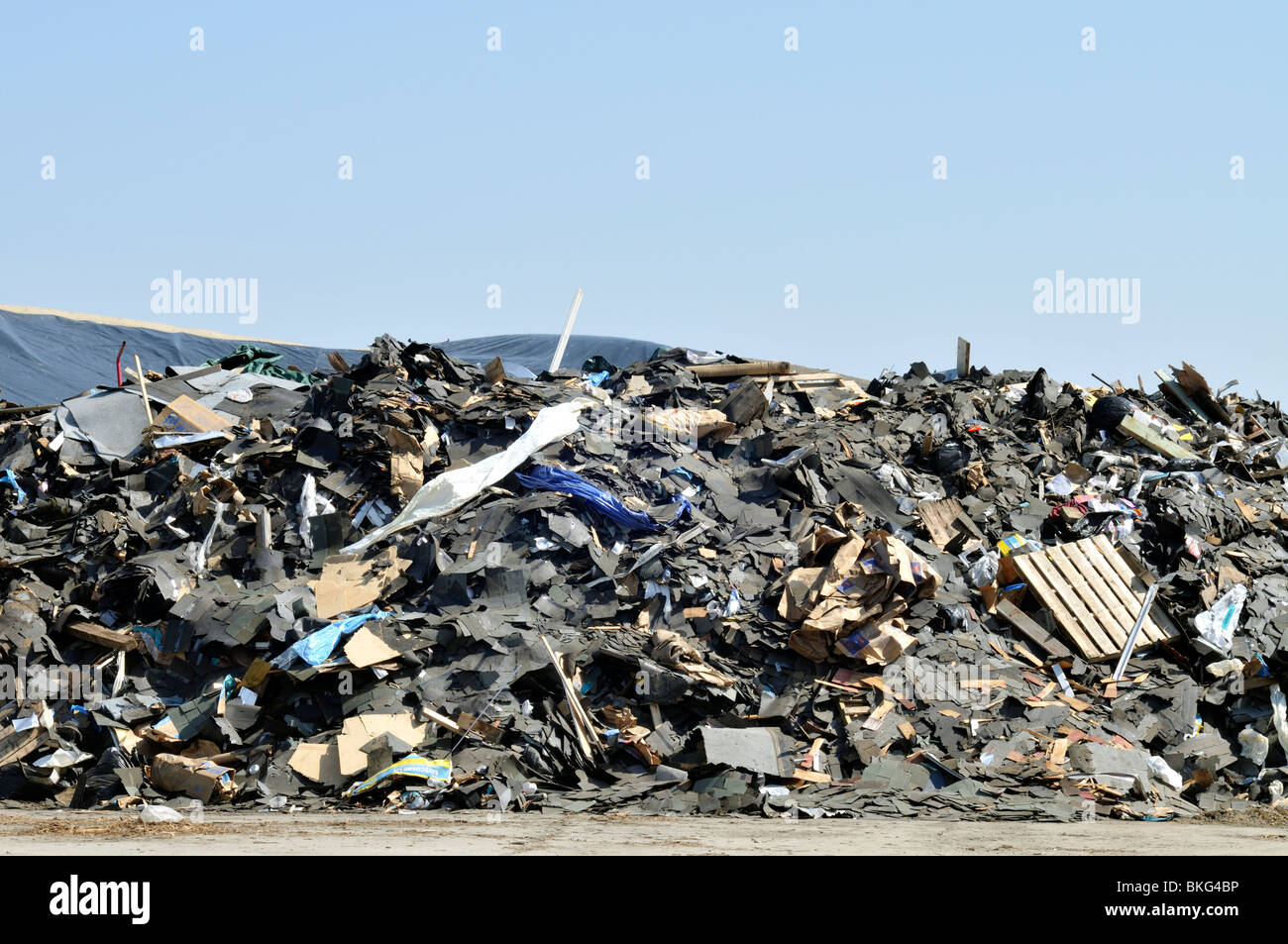 Large pile of commercial debris and trash at landfill in Bourne, Cape Cod Massachusetts usa Stock Photo