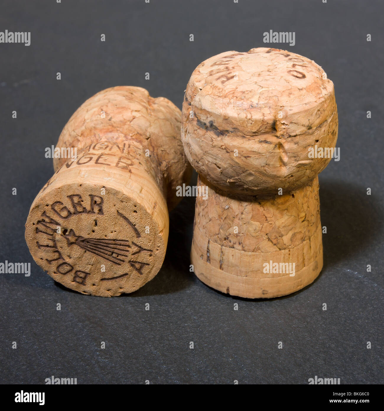 Bollinger Vintage Champagne Corks on dark slate background Stock Photo