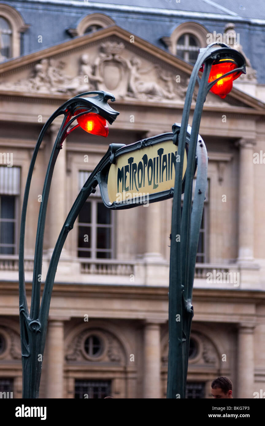 Palais Royal – Musée du Louvre (Paris Métro) Art Nouveau Metro station entrance with red lights on, Paris France Stock Photo