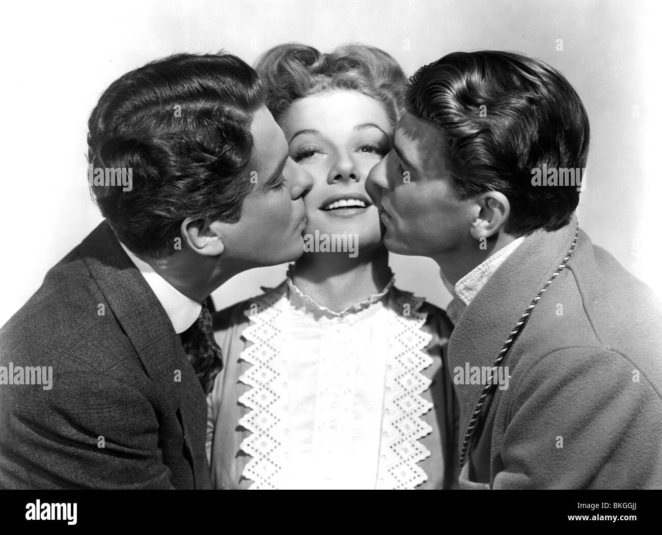 KINGS ROW (1942) ROBERT CUMMINGS, ANNE SHERIDAN, RONALD REAGAN KROW 001P L Stock Photo