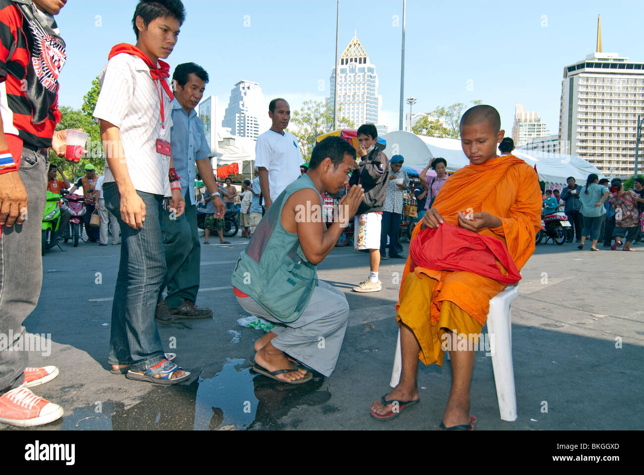 Novice monk blessing. Stock Photo