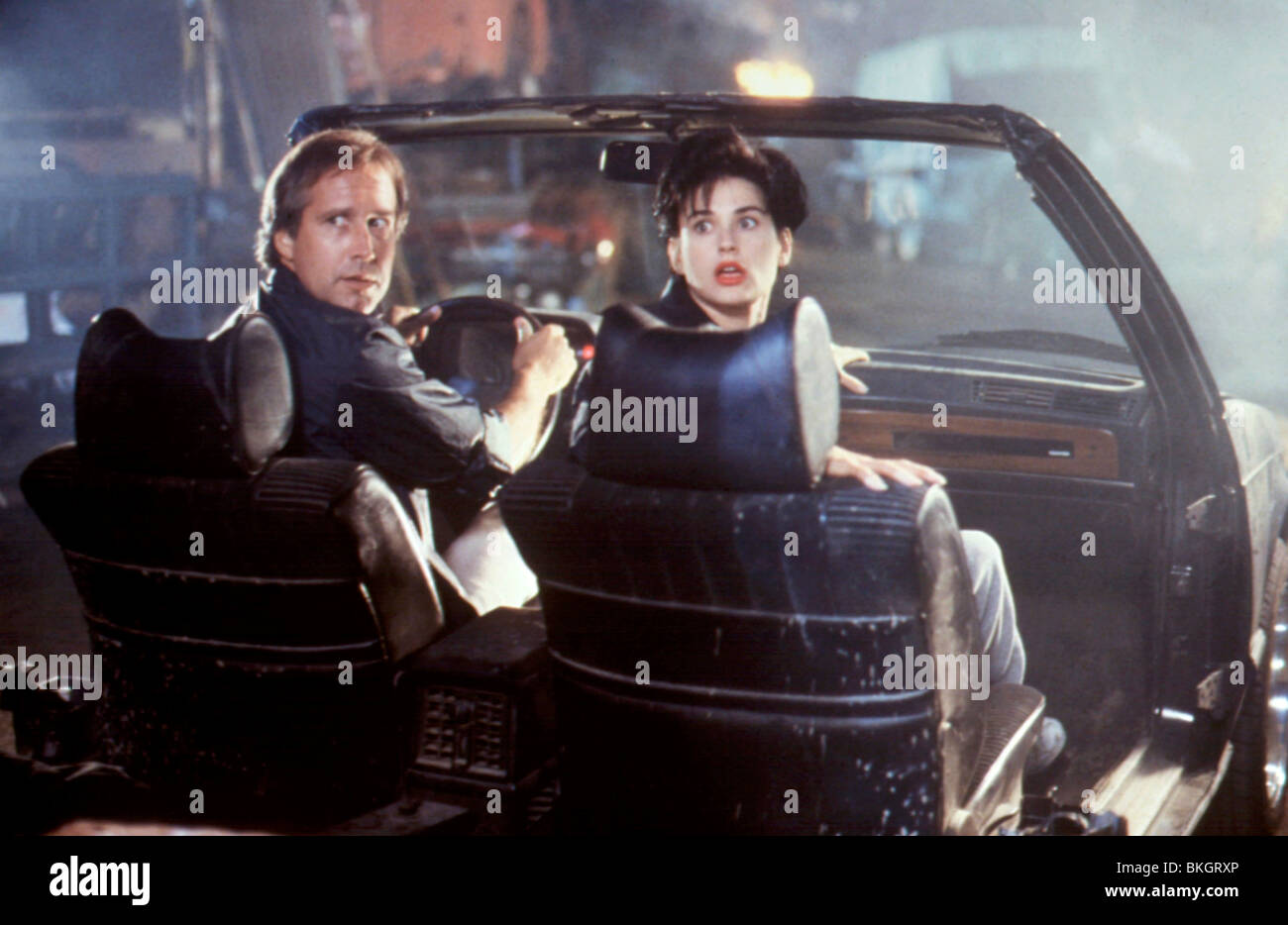 NOTHING BUT TROUBLE (1991) CHEVY CHASE, DEMI MOORE NBT 032 Stock Photo