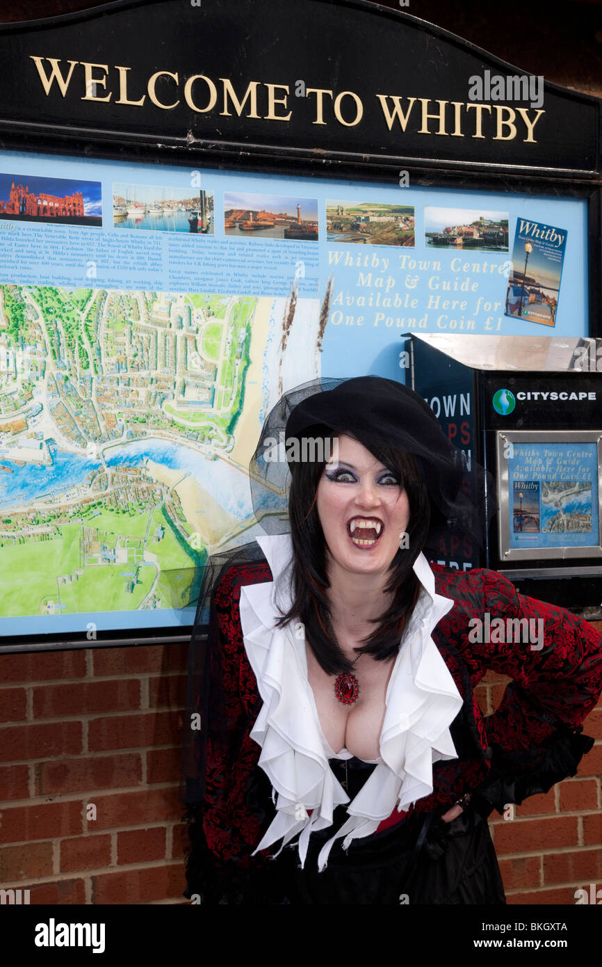 Woman wearing Halloween fancy dress costumes, with Dracula Vampire