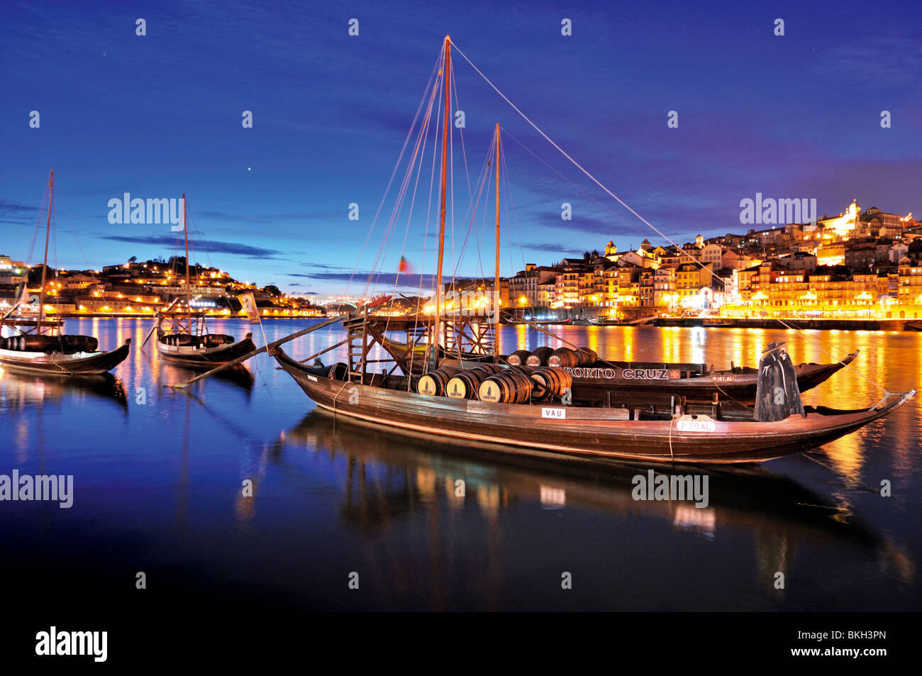 Portugal, Porto: Night view of the port wine ships at Vila Nova de Gaia at river Douro Stock Photo
