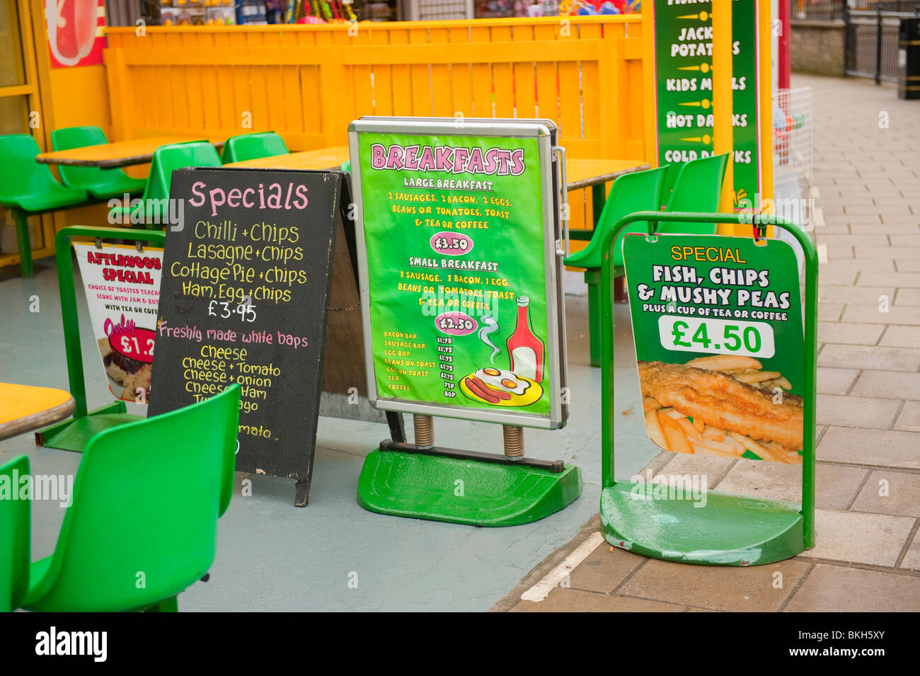 Advertising fish chips mushy peas seaside UK Stock Photo
