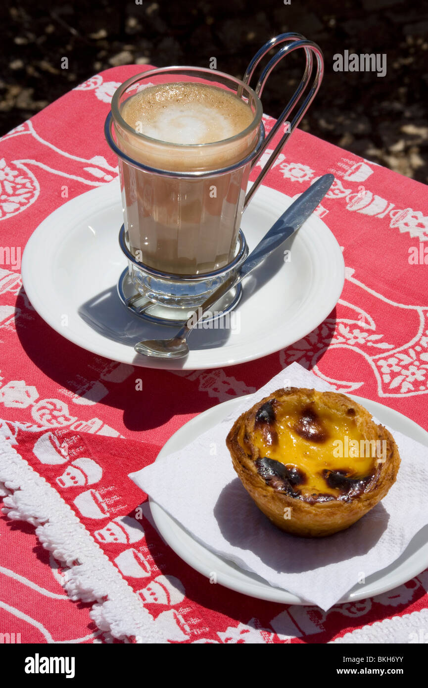 Portugal, a galao coffee and pastel da nata pastry, speciality of Belem, Lisbon Stock Photo