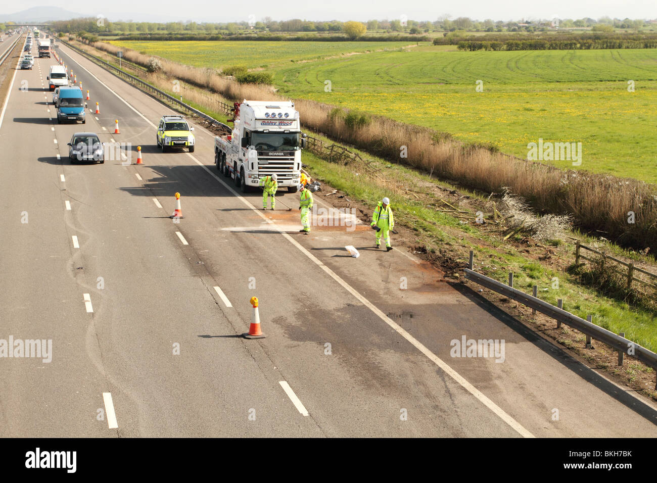 Cleaning up after a serious truck crash Stock Photo
