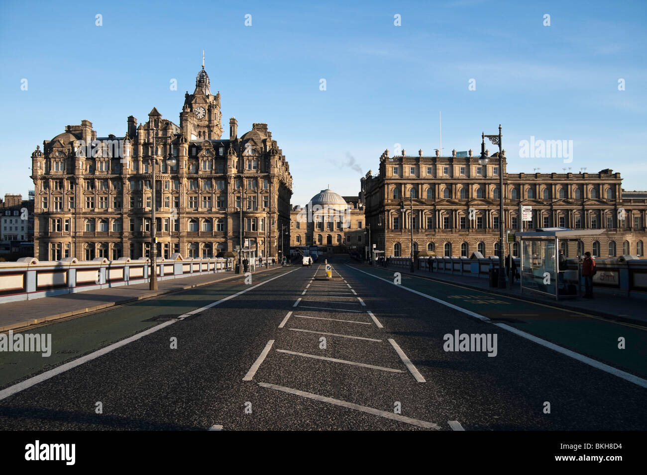 Looking north on Edinburgh's North Bridge (towards the Balmoral Hotel and the old GPO building) on a sunny morning. Stock Photo