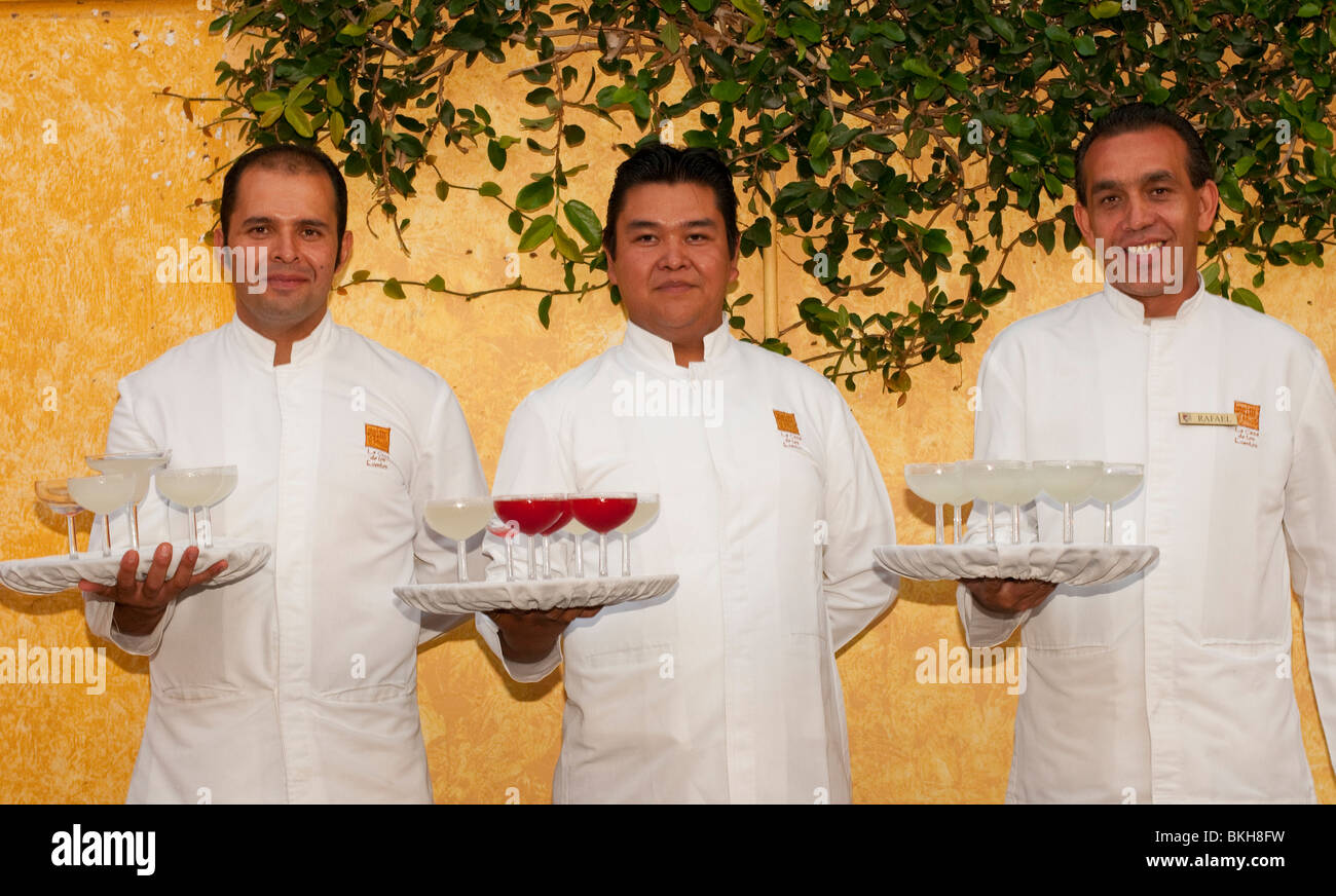 Waiters serving Margaritias at Jose Curevo Museum, Town of Tequila, Jalisco, Mexico Stock Photo