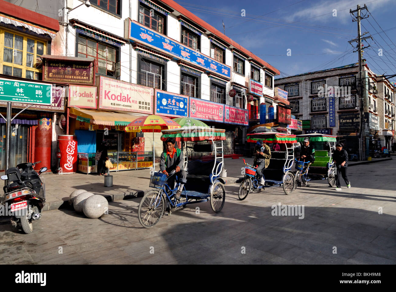 Trishaws,tricycle rickshaws,awaiting business, Lhasa,Tibet Stock Photo