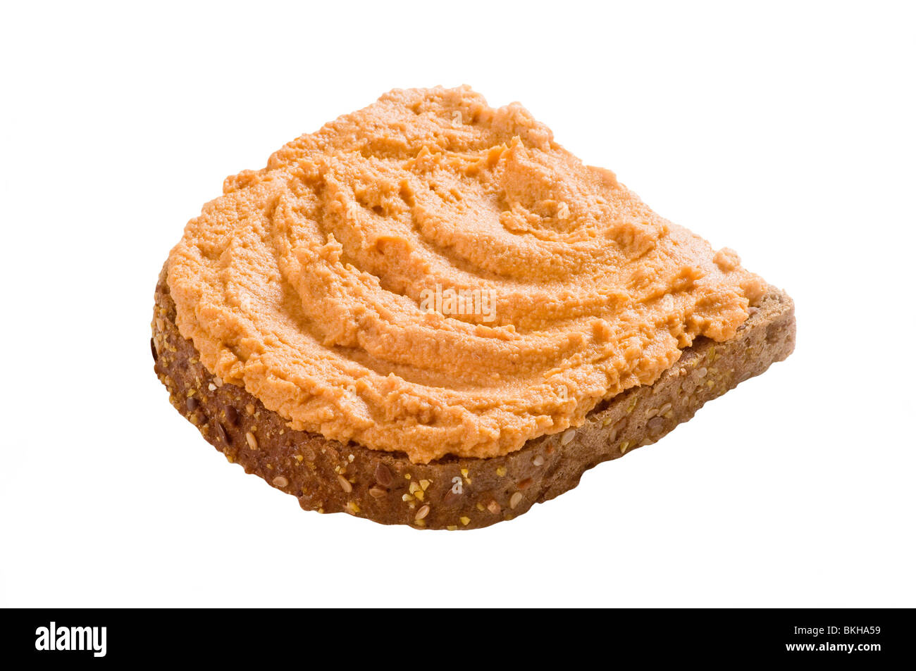 Slice of brown bread and spread Stock Photo Alamy