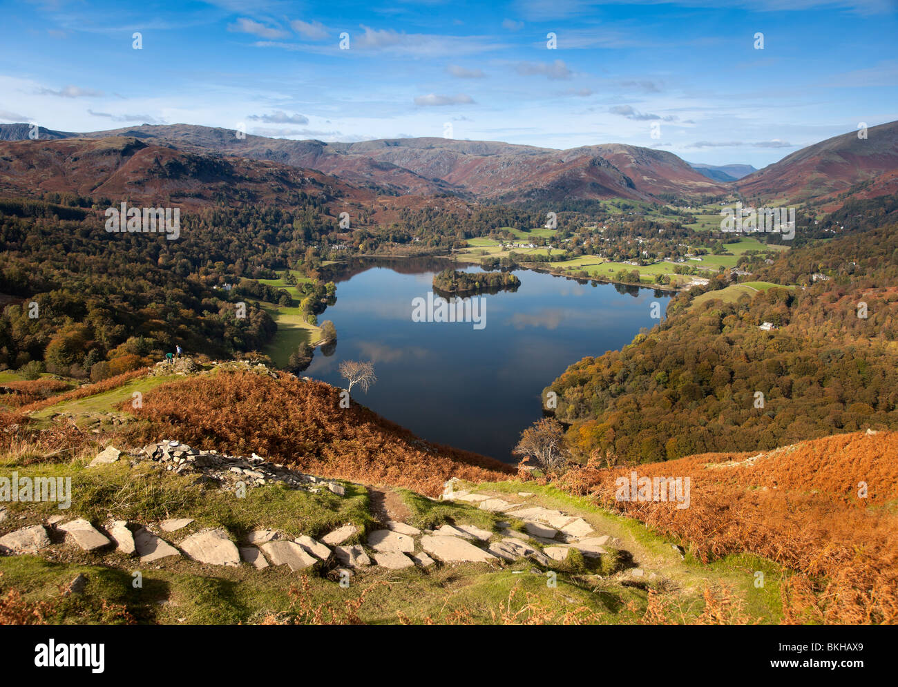 View over Grasmere and Grasmere village from Loughrigg Terrace in autumn, Lake District, Cumbria Stock Photo