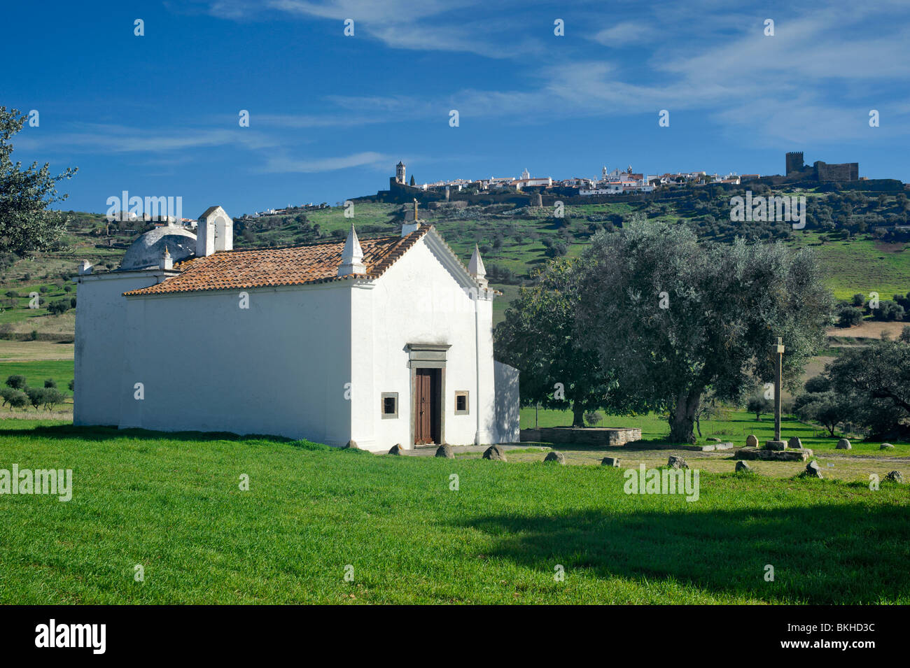 Portugal, the Alentejo, the Ermida de Sao Sebastiao with Monsaraz walled town in the distance Stock Photo