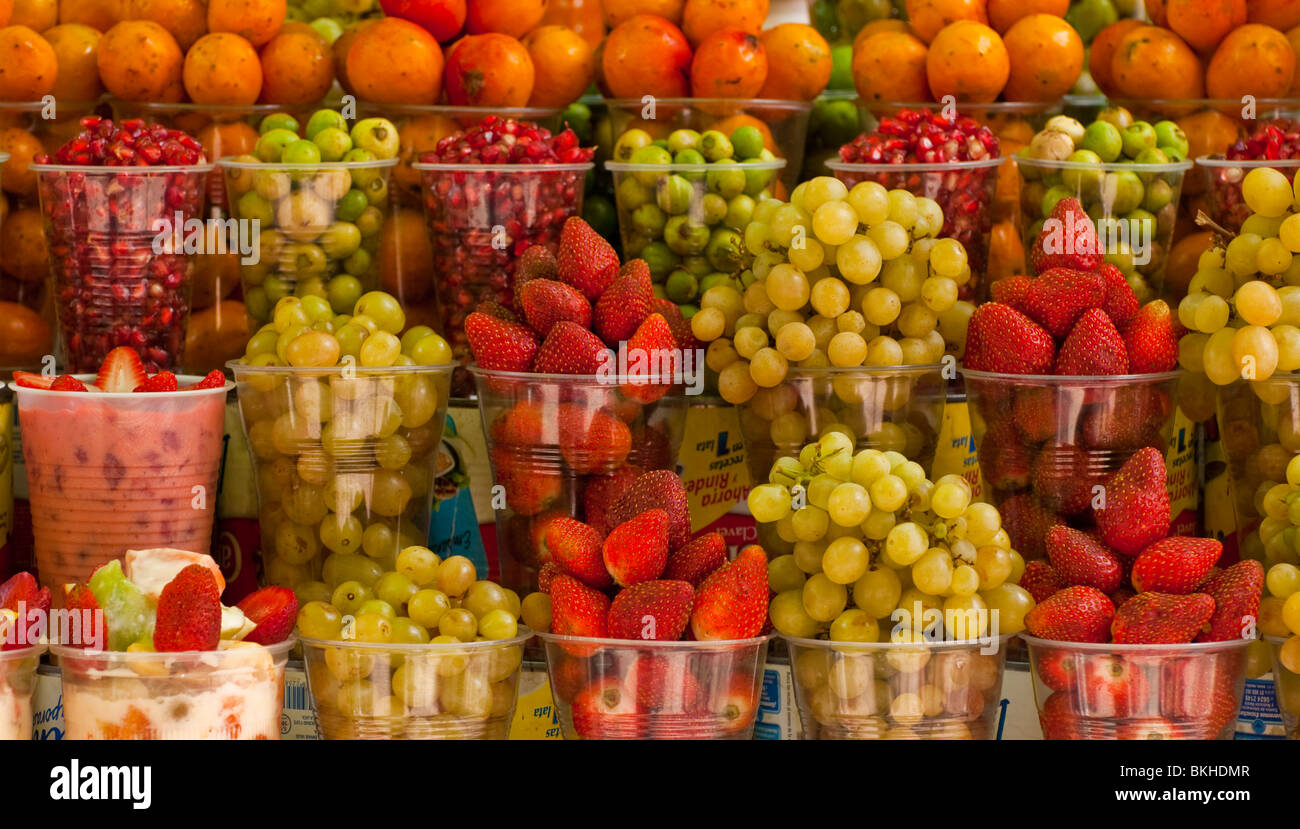 Guadalajara, Mexico, Colorful fruit cups lined up at vendors stand. Historic Old Town, Jalisco