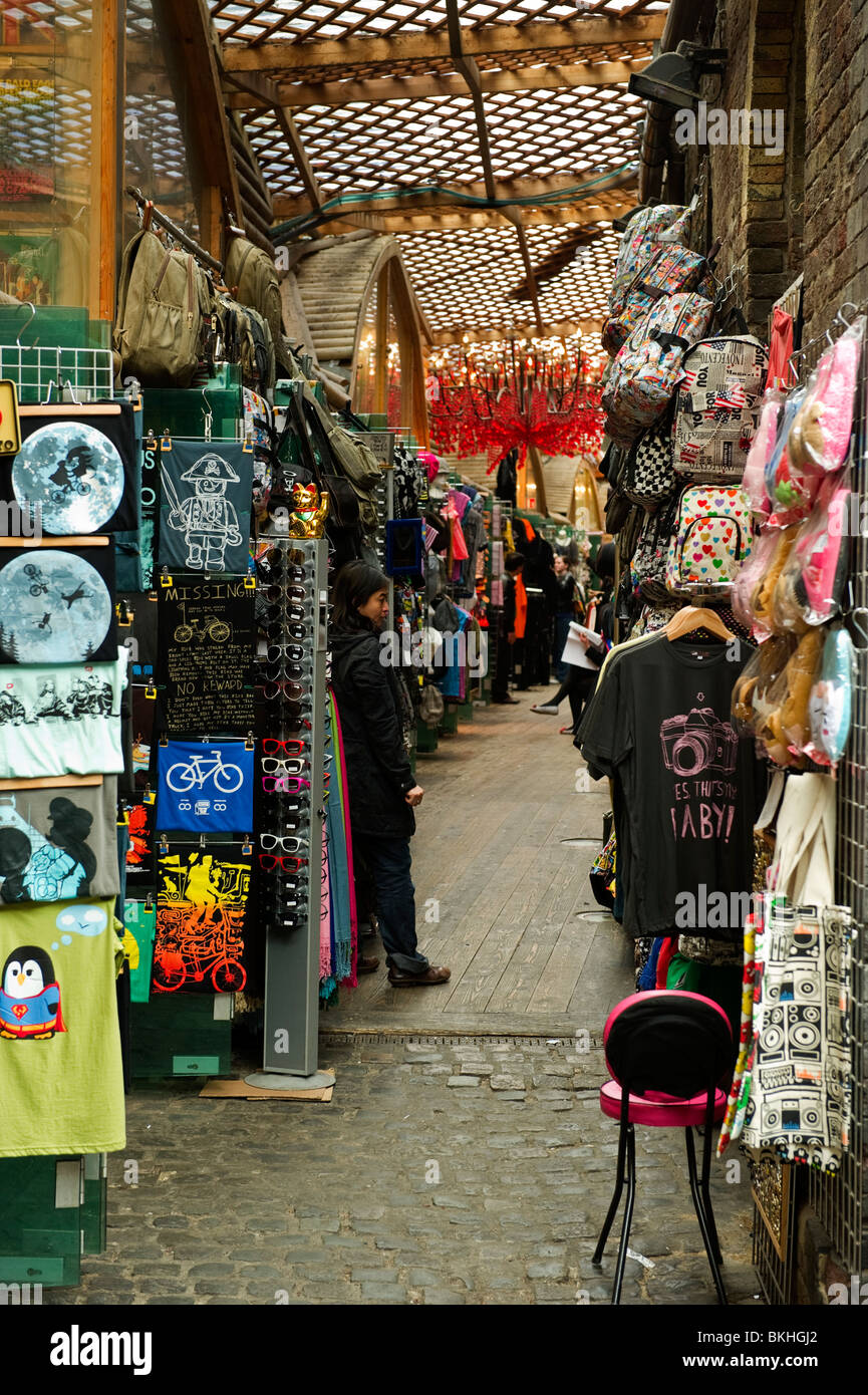 a passageway through clothing, fabric, materials and souvenir market