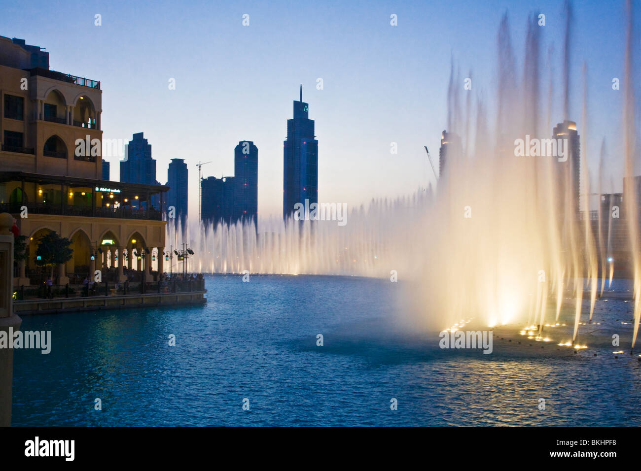 The spectacular Dubai Fountain display in front of the Souk al Bahar in downtown Dubai, UAE Stock Photo