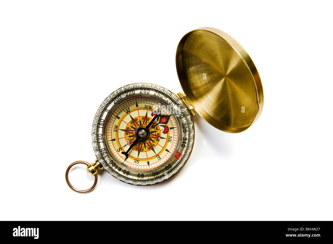 Antique brass compass on white background with soft shadow Stock Photo