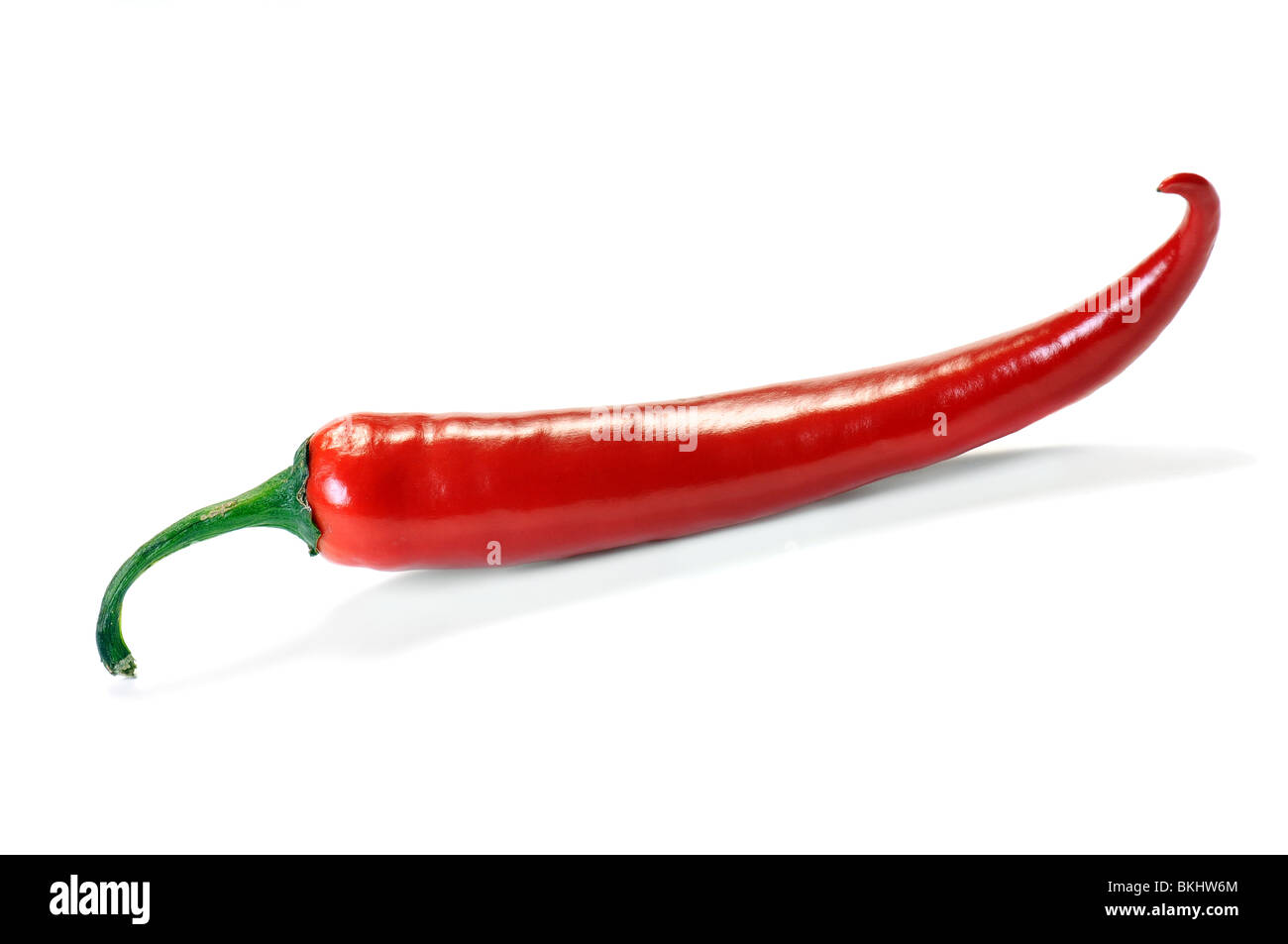 One red chili pepper with soft shadow over white Stock Photo