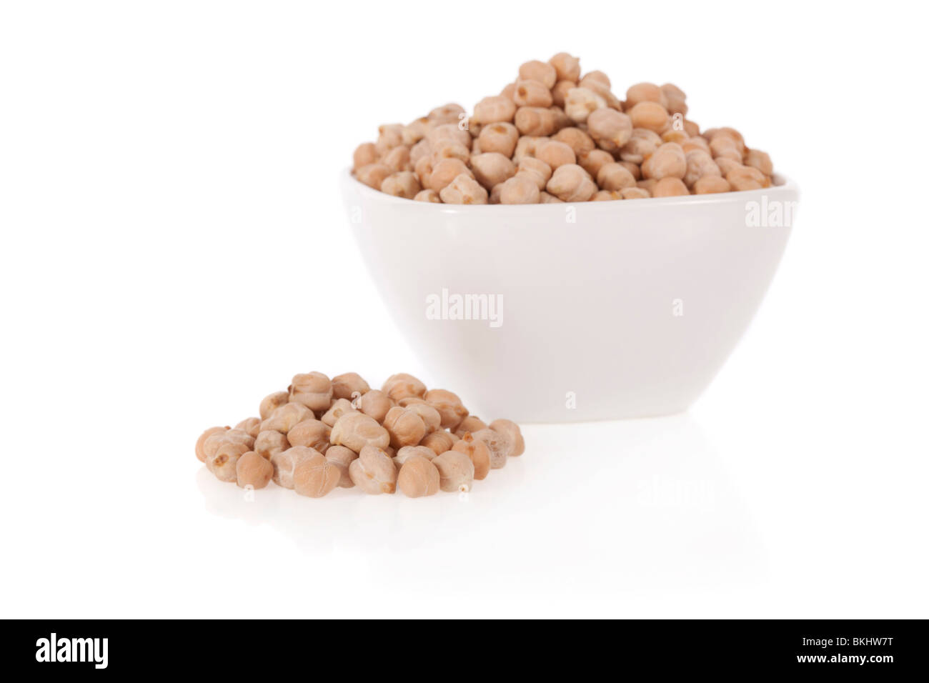 White chickpeas in a bowl isolated on a white background Stock Photo