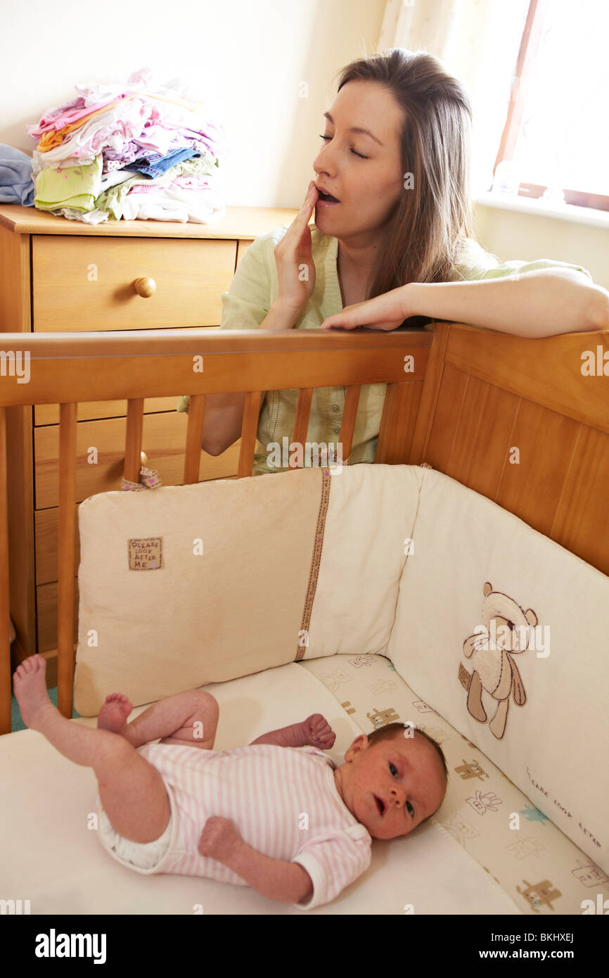 Woman alone with baby Stock Photo Alamy