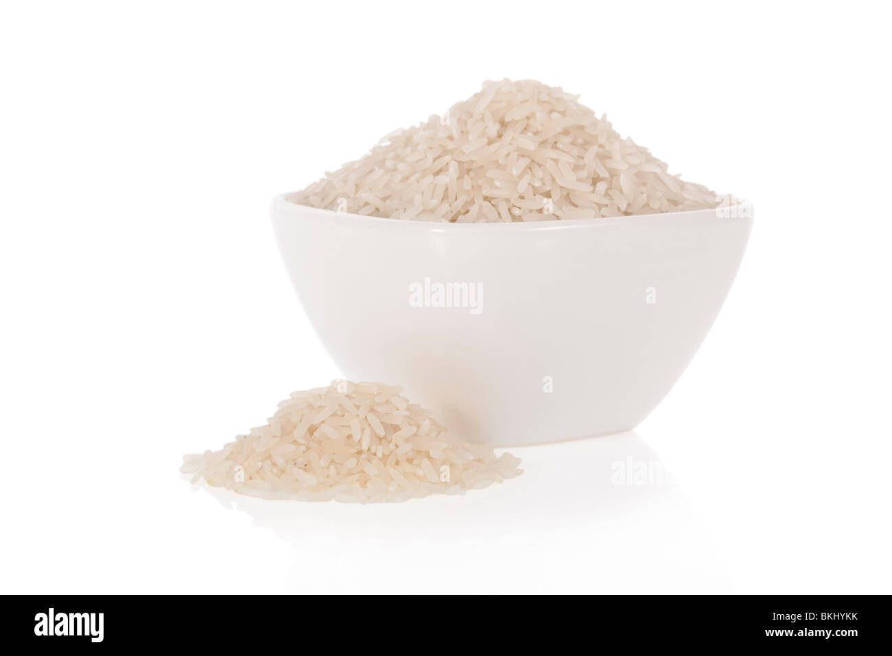 Long grain white rice in a bowl isolated on a white background Stock Photo