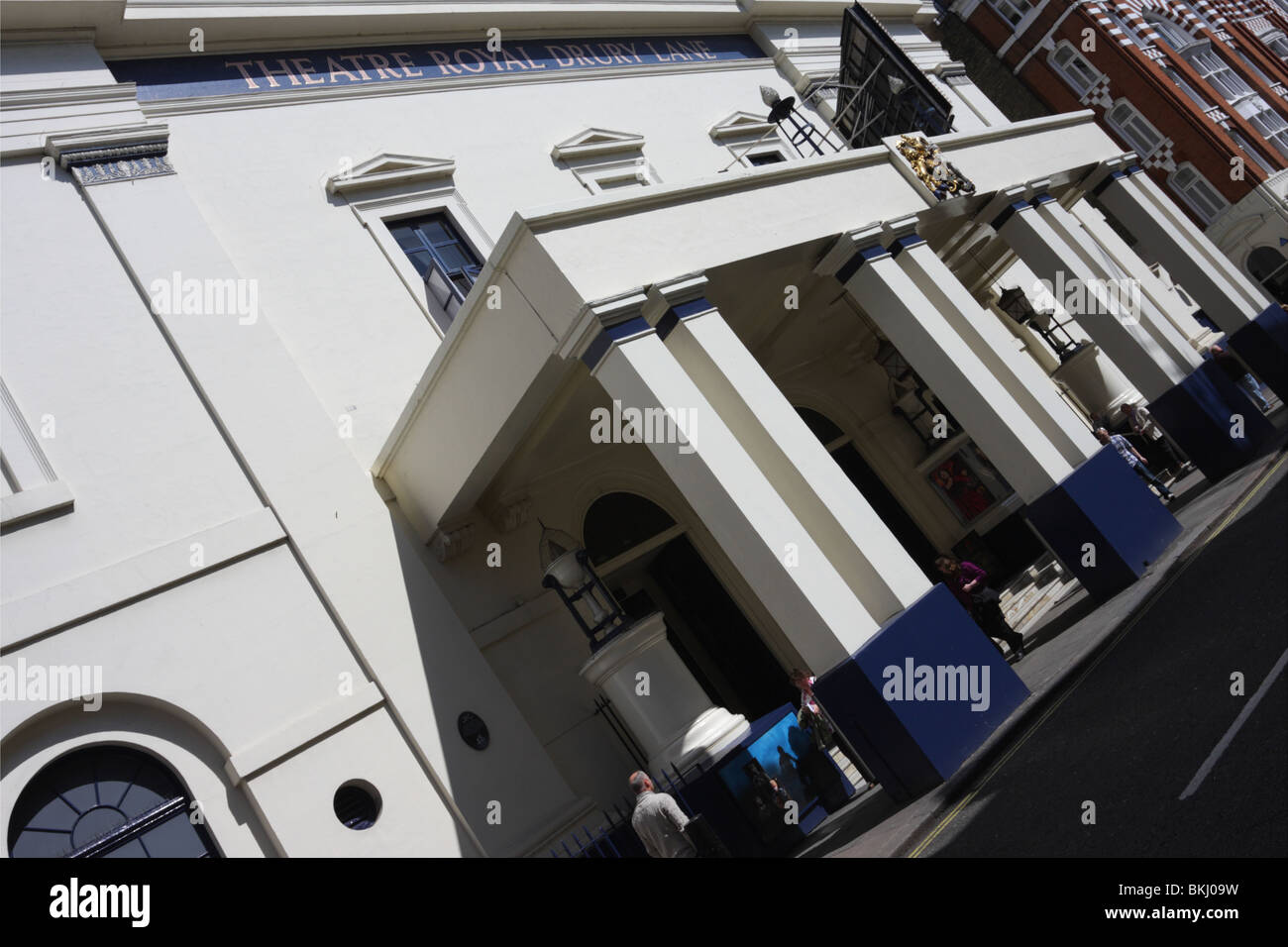 Extreme angled aspect to the main entrance to the Theatre Royal Drury Lane in London`s Covent Garden. Stock Photo