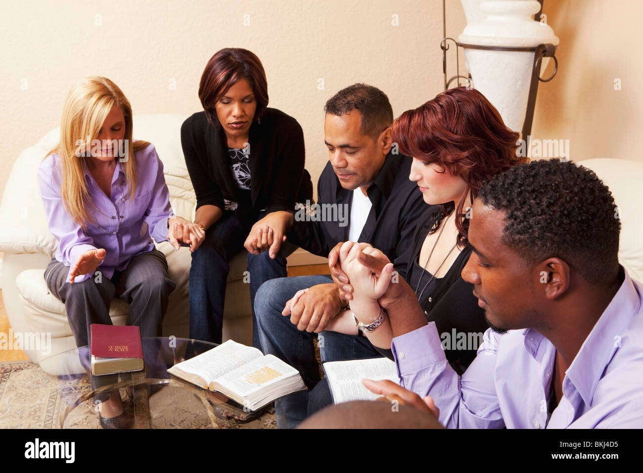 Group of people praying home christian hires stock photography and images Alamy