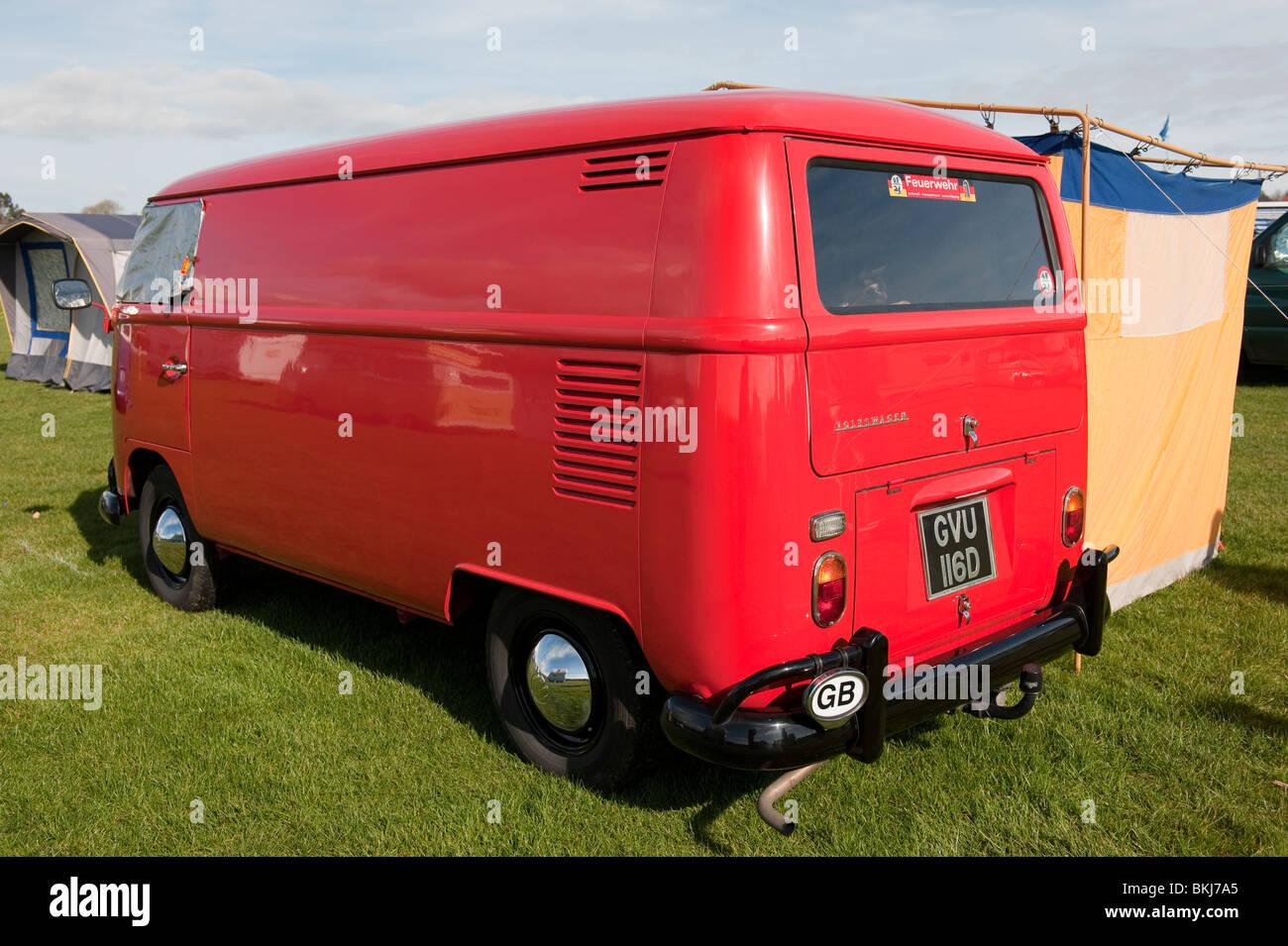 Old red Volkswagen campervan Stock Photo