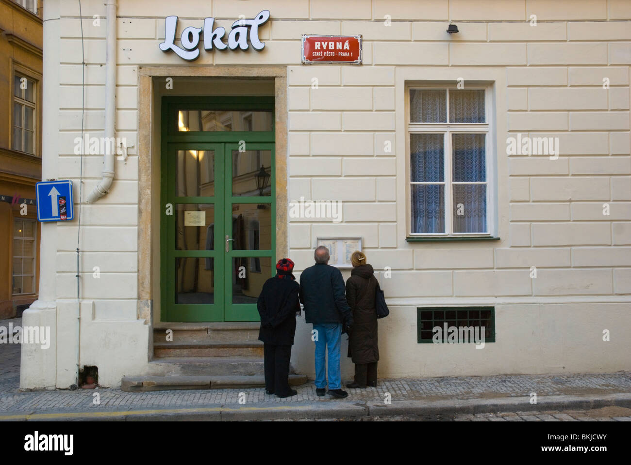 People in front of Lokal restaurant opened 2009 old town Prague Czech Republic Europe Stock Photo